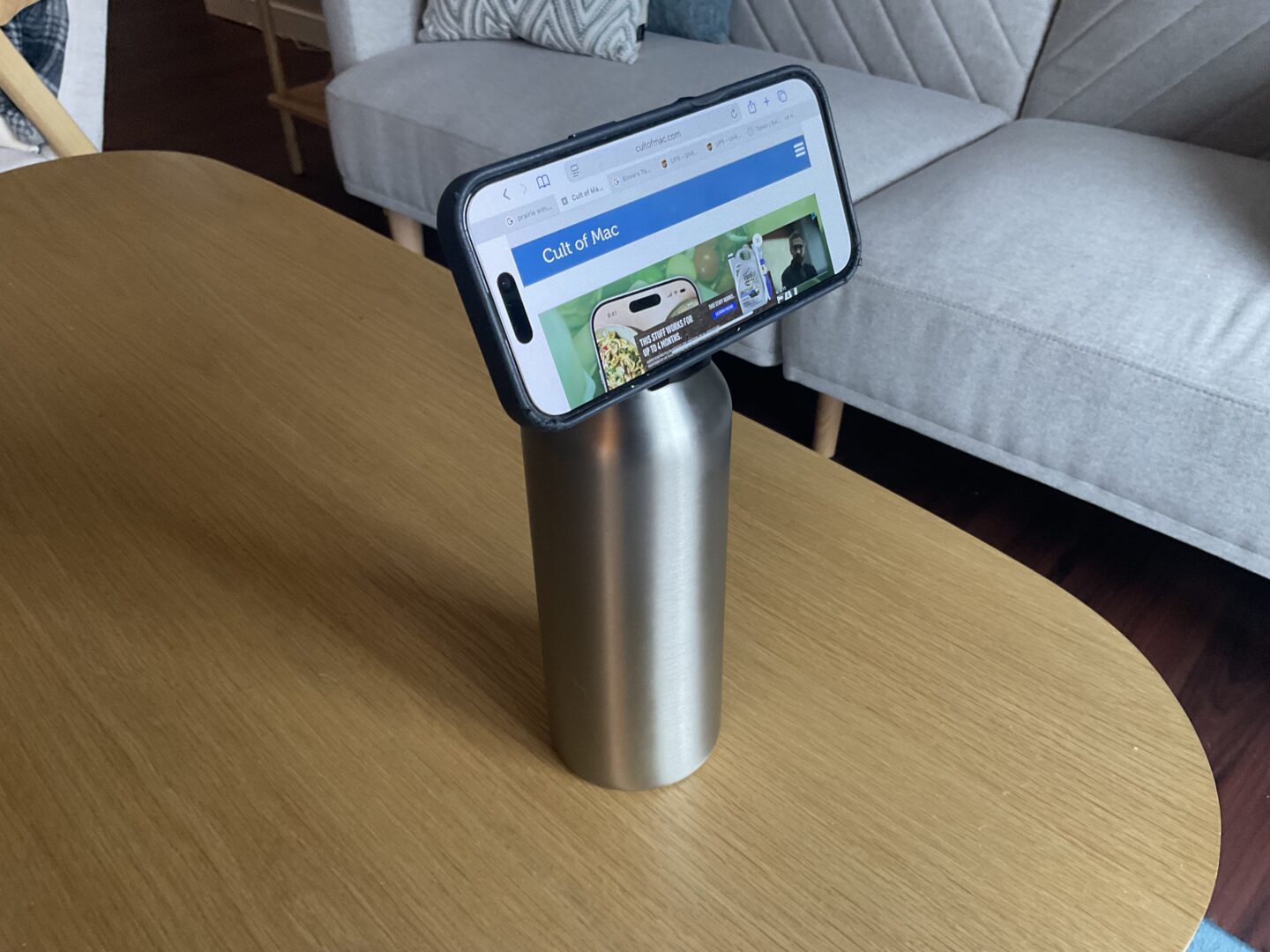 Journey Reevus bottle with iPhone